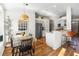 Open kitchen and dining area with stainless steel appliances and modern finishes at 4510 Beaumaris Dr, Land O Lakes, FL 34638