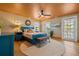 Charming bedroom with vibrant colors, unique decor, and plenty of natural light at 511 Windward Psge, Clearwater Beach, FL 33767