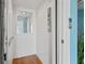 Interior elevator with wood flooring and white walls for easy access between floors at 511 Windward Psge, Clearwater Beach, FL 33767