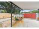 Spacious carport area with a fenced backyard at 516 Northmoor N Ave, St Petersburg, FL 33702