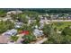 Property aerial shot showcasing its proximity to the main road and surrounding trees at 5323 73Rd N St, St Petersburg, FL 33709