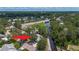 A cozy residence nestled in a serene neighborhood near a tranquil waterway and adjacent to lush landscaping at 5323 73Rd N St, St Petersburg, FL 33709