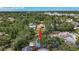 Beautiful aerial shot of property backing up to waterway with lush trees surrounding homes at 5323 73Rd N St, St Petersburg, FL 33709
