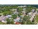 Aerial shot revealing a cozy home nestled between mature trees, offering privacy and a serene setting at 5323 73Rd N St, St Petersburg, FL 33709
