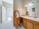 Bathroom featuring a vanity with countertop space and a standing mirror at 5323 73Rd N St, St Petersburg, FL 33709