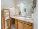 A tidy bathroom with a large mirror and spacious vanity area at 5323 73Rd N St, St Petersburg, FL 33709