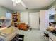 Spacious bedroom with a ceiling fan and an open closet at 5323 73Rd N St, St Petersburg, FL 33709