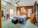 Large primary bedroom with modern furniture and an attached bath at 5323 73Rd N St, St Petersburg, FL 33709