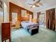 Spacious bedroom with a high ceiling, neutral walls, and outdoor access at 5323 73Rd N St, St Petersburg, FL 33709