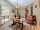 Dining room with a large window and wicker chairs at 5323 73Rd N St, St Petersburg, FL 33709