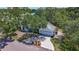 Charming single-story home with a well-manicured lawn, mature trees, and a two-car attached garage at 5323 73Rd N St, St Petersburg, FL 33709