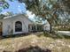 Attractive home showcasing a well-kept front yard and a welcoming facade at 5323 73Rd N St, St Petersburg, FL 33709