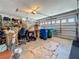 Spacious garage with an open garage door and room to park several cars at 5323 73Rd N St, St Petersburg, FL 33709