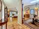 Spacious living area with hardwood floors and a view of the kitchen and patio at 5323 73Rd N St, St Petersburg, FL 33709