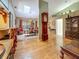 Spacious living room with skylight, hardwood floors, and access to multiple living areas at 5323 73Rd N St, St Petersburg, FL 33709