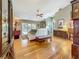 Bright and airy living room with hardwood floors, neutral decor, and sliding doors to the lanai at 5323 73Rd N St, St Petersburg, FL 33709
