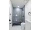 Modern bathroom features a tiled walk-in shower and sleek vanity at 6304 S S Grady Ave, Tampa, FL 33616