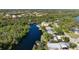 A beautiful aerial view of the home and its private, waterfront location along the river at 6814 68Th E Ave, Bradenton, FL 34203