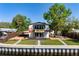 Backyard on waterfront featuring a beautiful patio, walkway and landscaping at 6814 68Th E Ave, Bradenton, FL 34203