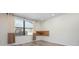 Bedroom with neutral paint, modern trim, large windows, and hard surface floors at 6814 68Th E Ave, Bradenton, FL 34203
