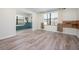 Open concept bedroom featuring hard surface floors, neutral paint and large windows at 6814 68Th E Ave, Bradenton, FL 34203