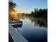 Picturesque waterfront view with a boat, showcasing a tranquil, sunny morning scene at 6814 68Th E Ave, Bradenton, FL 34203