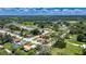 Charming single-story home in a tranquil neighborhood, with a spacious yard and mature trees at 8445 Angela Ct, Zephyrhills, FL 33541