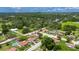 Desirable single-story home featuring a large yard, storage shed, mature trees, and quiet neighborhood at 8445 Angela Ct, Zephyrhills, FL 33541