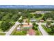 Charming single-story home featuring a fenced yard and mature trees in a quiet, established neighborhood at 8445 Angela Ct, Zephyrhills, FL 33541