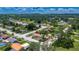 Charming single-story home in a tranquil neighborhood, with a spacious yard and mature trees at 8445 Angela Ct, Zephyrhills, FL 33541
