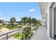 Balcony with serene neighborhood and partial waterway views at 905 Bay Point Dr, Madeira Beach, FL 33708