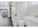 Bright bathroom featuring a contemporary soaking tub and an additional vanity at 905 Bay Point Dr, Madeira Beach, FL 33708