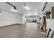 Large garage with tile flooring and plenty of space for storage and parking at 905 Bay Point Dr, Madeira Beach, FL 33708
