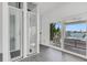 Features an indoor lift and large sliding glass doors that provide access to the waterfront at 905 Bay Point Dr, Madeira Beach, FL 33708