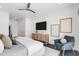 Bright and modern main bedroom with a seating area at 905 Bay Point Dr, Madeira Beach, FL 33708