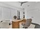 Home office featuring a modern desk, comfortable seating, and stylish decor at 905 Bay Point Dr, Madeira Beach, FL 33708