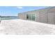 Wide angle view of a modern rooftop terrace offering stunning water views at 905 Bay Point Dr, Madeira Beach, FL 33708