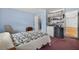 Spacious bedroom with laundry hookups and a utility room nearby, featuring blue walls at 9120 108Th St, Seminole, FL 33772