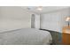 Bright bedroom with a ceiling fan, closet, and soft carpeting for a comfortable space at 9120 108Th St, Seminole, FL 33772