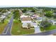 A charming single-story home features a well-manicured lawn and a welcoming driveway at 9120 108Th St, Seminole, FL 33772