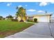 Charming home exterior featuring a well-manicured lawn and inviting curb appeal at 9120 108Th St, Seminole, FL 33772