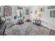 Bright bonus room with pool views and coastal decor, featuring Americana accents at 920 Tuscanny St, Brandon, FL 33511