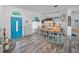 Stylish dining room with a large table, modern lighting, and eye catching decor at 920 Tuscanny St, Brandon, FL 33511