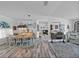 Dining room featuring hardwood floors and views into the living area at 920 Tuscanny St, Brandon, FL 33511
