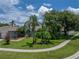 Lush lawn and landscaping surrounds this well maintained home at 920 Tuscanny St, Brandon, FL 33511
