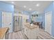Open kitchen with stainless steel appliances, breakfast bar, an island and eat-in dining at 920 Tuscanny St, Brandon, FL 33511