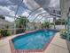Backyard pool with tropical landscaping at 920 Tuscanny St, Brandon, FL 33511