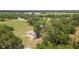 Aerial view of property, including livestock pen and outbuilding at 9819 Allen Rd, Lithia, FL 33547