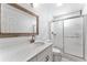 Bright bathroom with white subway tiles, modern fixtures, and patterned floor at 9819 Allen Rd, Lithia, FL 33547