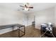 This is a spacious bedroom with modern wood-look flooring and light walls at 9819 Allen Rd, Lithia, FL 33547